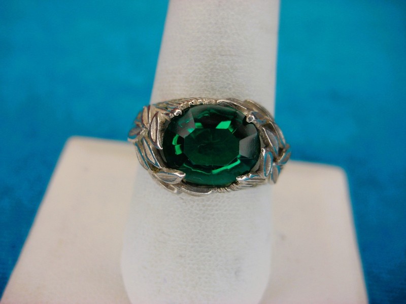 Sterling silver filigree ring with green stone and leaves, size 9.75