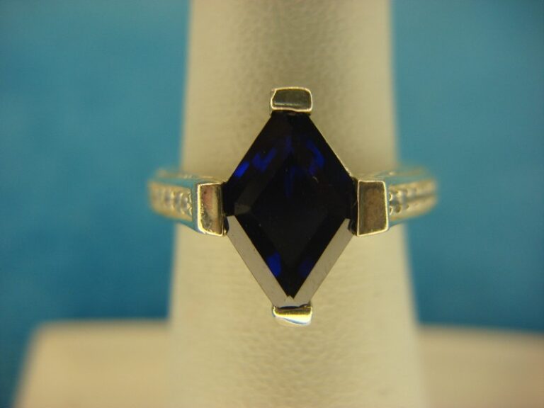 Deep blue stone sterling silver ring with diamond simulants, size 6