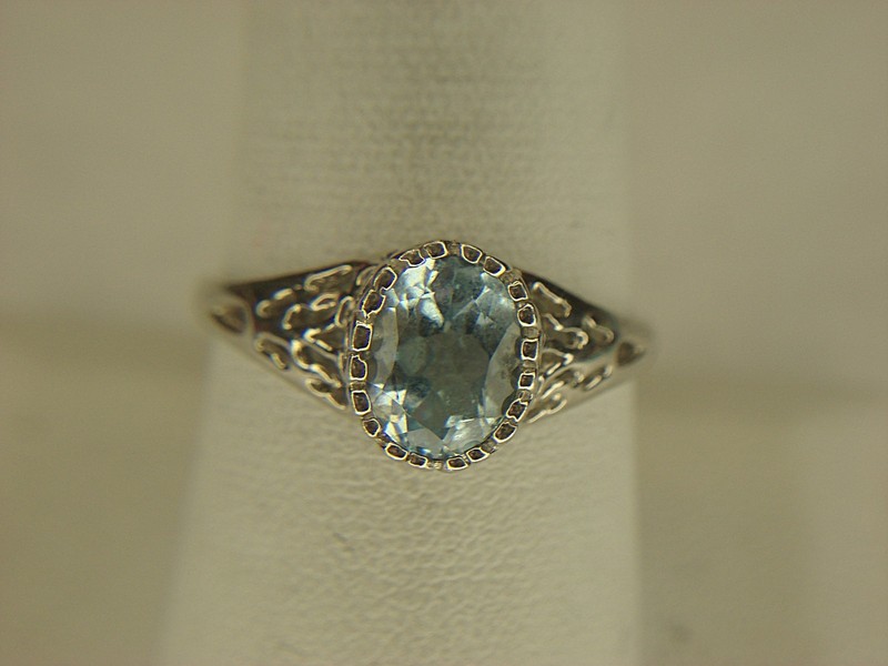 Sterling silver filigree ring with a light blue stone, size 9