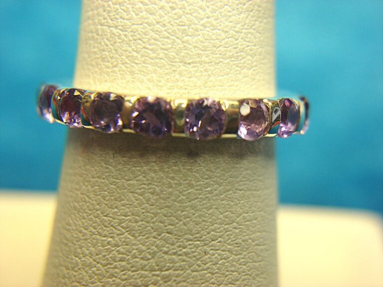 Sterling silver band ring with purple stones, size 10