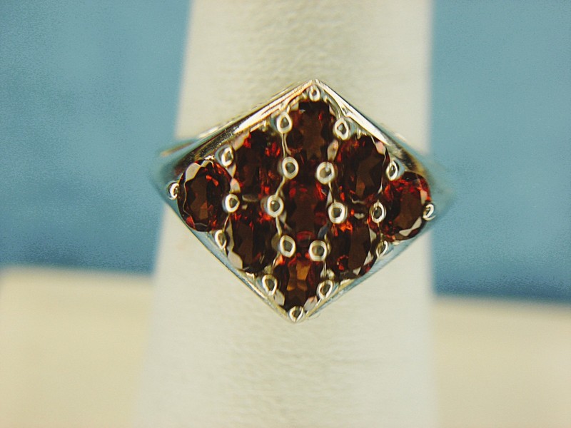 Sterling silver ring with fancy red stone setting, size 7