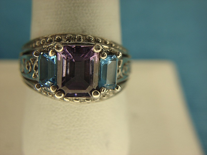 Sterling silver ring with blue and purple gemstones, size 9 3/4