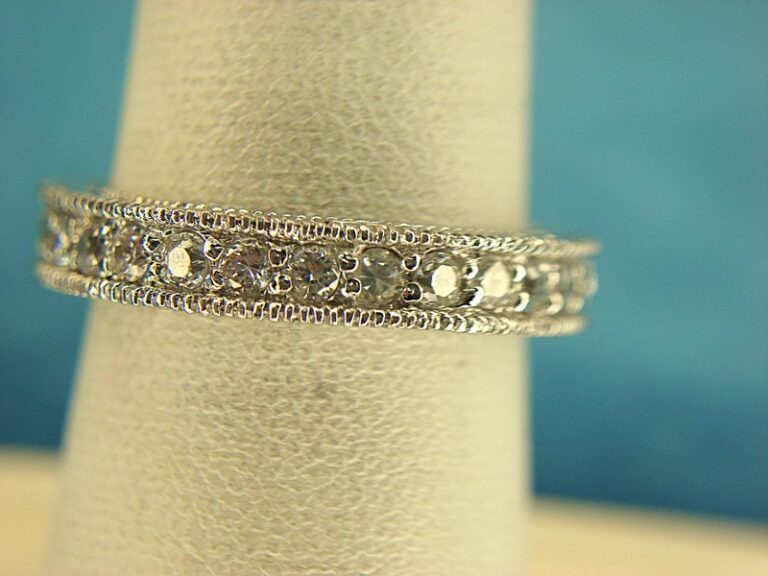 Sterling silver band ring with round simulated diamonds, size 7