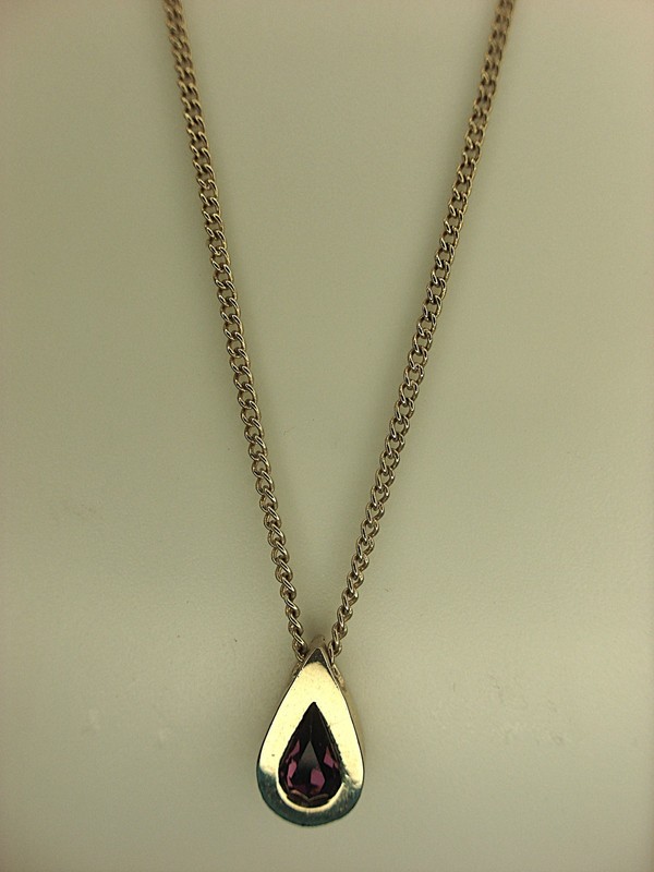 Avon Gold Tone Necklace with Faux Amethyst Pendant