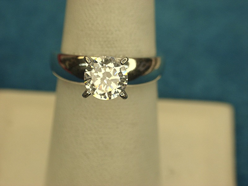 Sterling silver ring with simulated diamond and 'I LOVE YOU' inscription, size 7