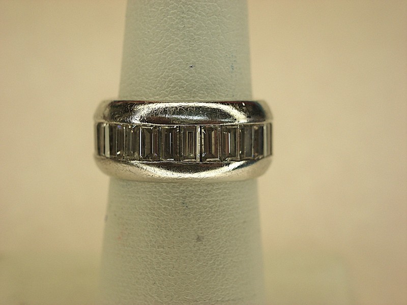 Sterling silver band ring with baguette cubic zirconia stones, size 6