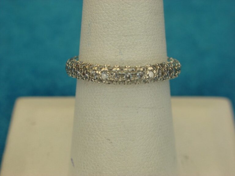 Sterling silver ring with round cubic zirconia stones, size 7 3/4