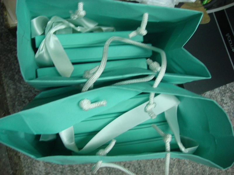 Set of 12 Tiffany & Co gift cards with a total value of $600. Includes decorative boxes.