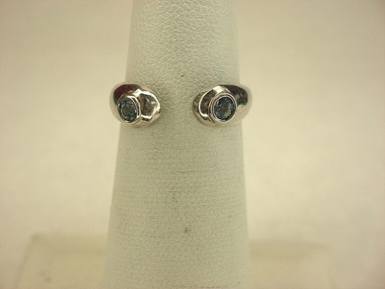 Sterling silver face-to-face ring with blue topaz gemstones, size 5-7