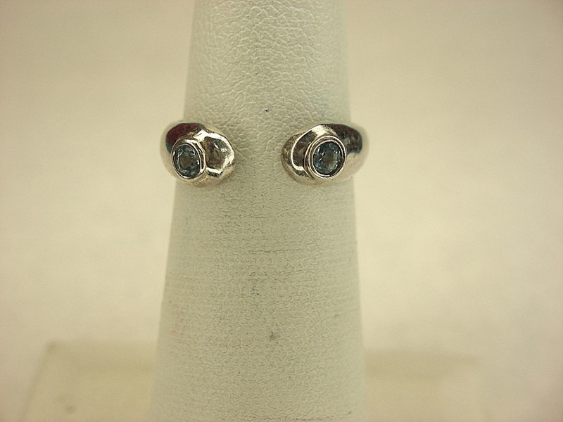 Sterling silver face-to-face ring with blue topaz gemstones, size 5-7
