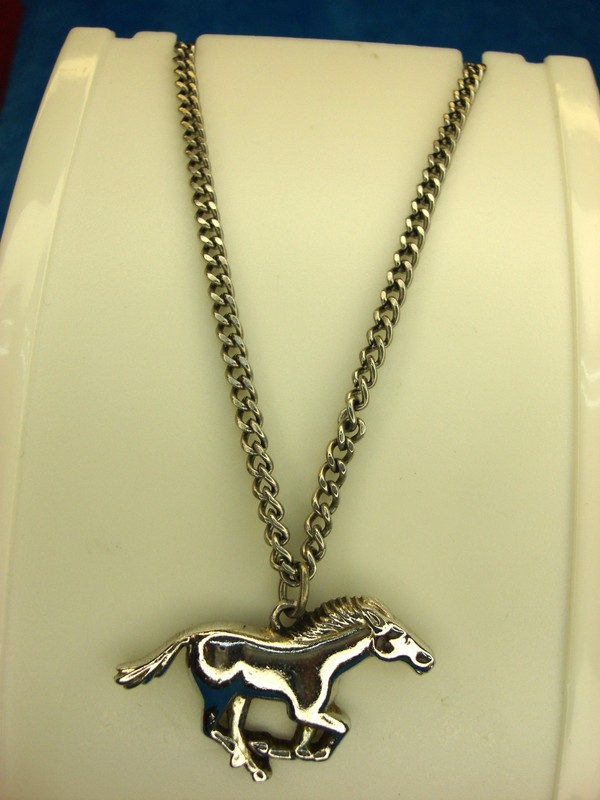 Vintage Avon silver-tone horse necklace pendant