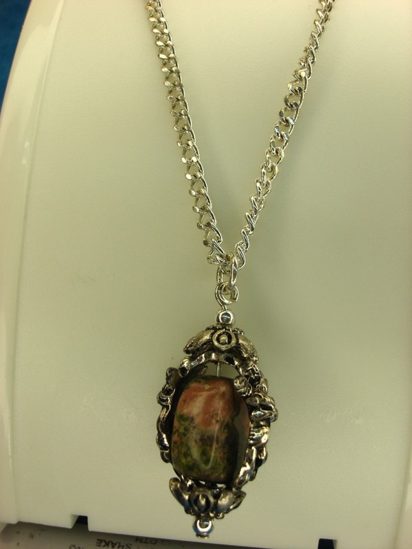 Elegant silver-tone chain and pendant with genuine unakite stone and cherub design