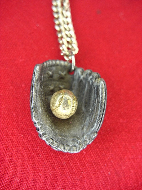 Vintage Avon baseball necklace with silver-tone chain and glove pendant