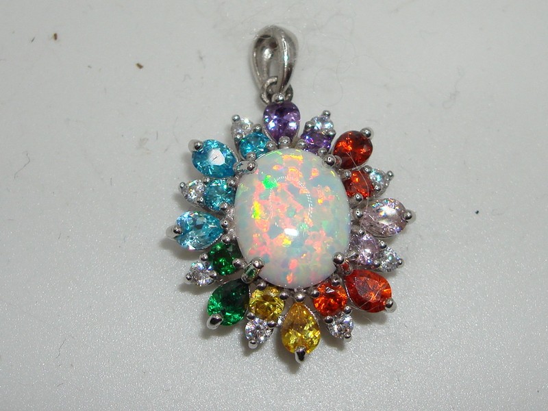 Stunning JCM sterling silver opal pendant with cubic zirconia accents