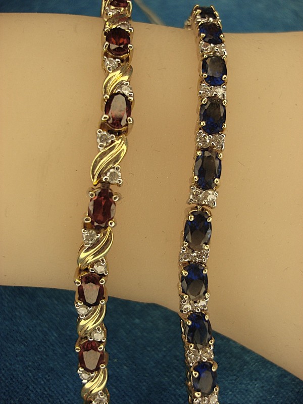 Vintage gold-tone bracelet set with red and blue stones