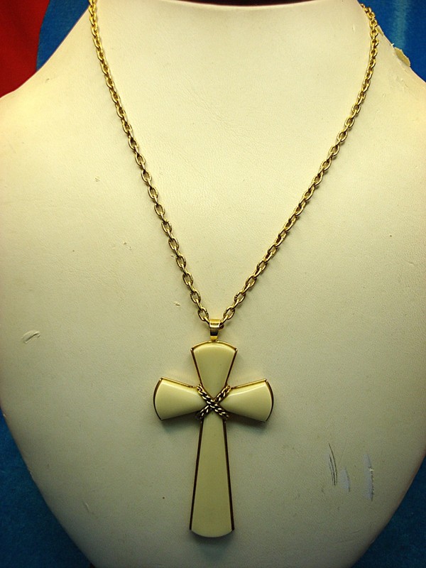 Vintage Avon gold tone cross necklace with cream accent