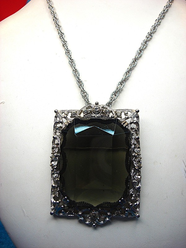 Vintage Sarah Coventry necklace with a large faux smoky topaz pendant and diamond simulants.
