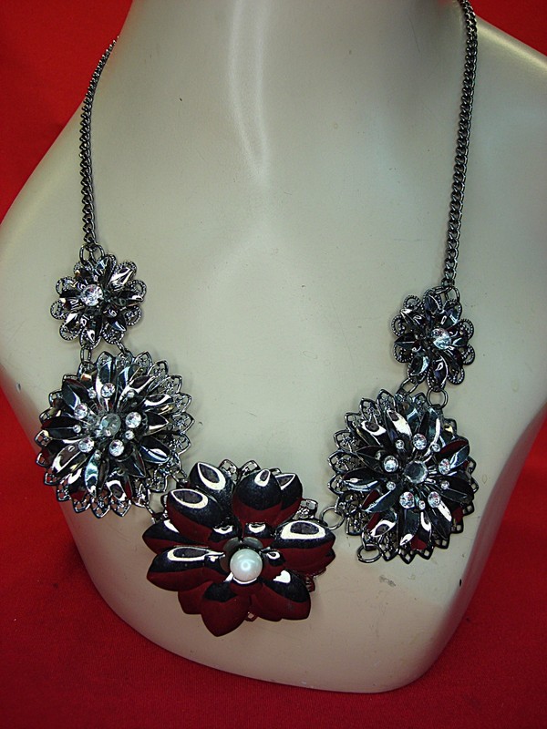 Vintage blackened metal necklace with simulated diamonds and faux pearl flowers