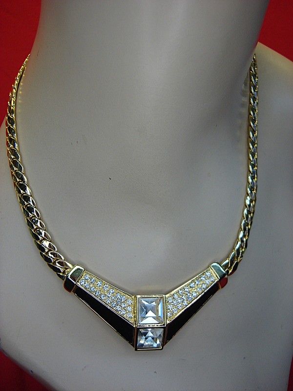 Vintage gold tone choker necklace with black enamel, topaz, and faux diamonds
