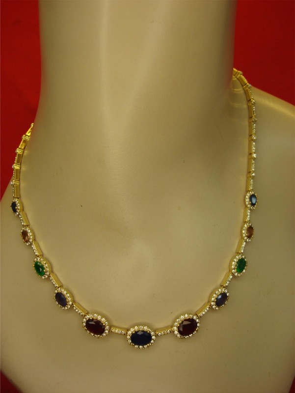 Vintage gold tone necklace with five colorful gemstones