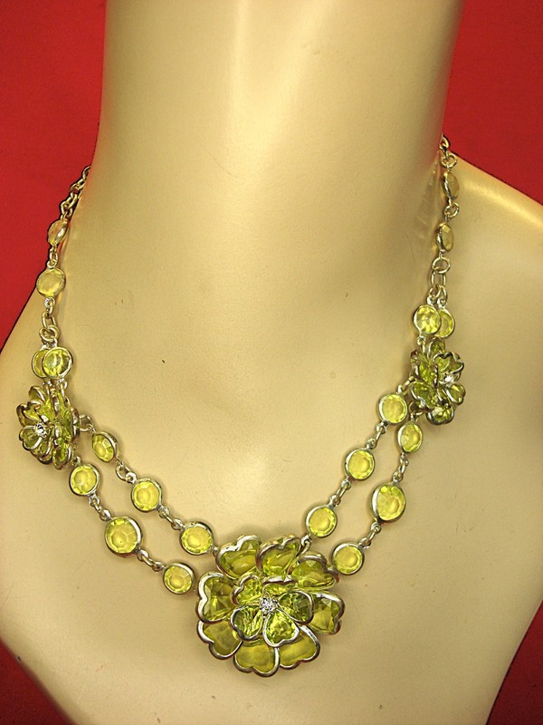 Vintage silver-tone necklace with pale green circles and hearts