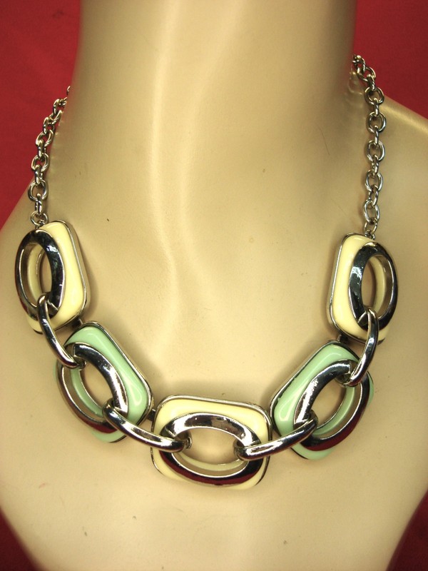 Vintage silver tone necklace with cream and jade green pendants