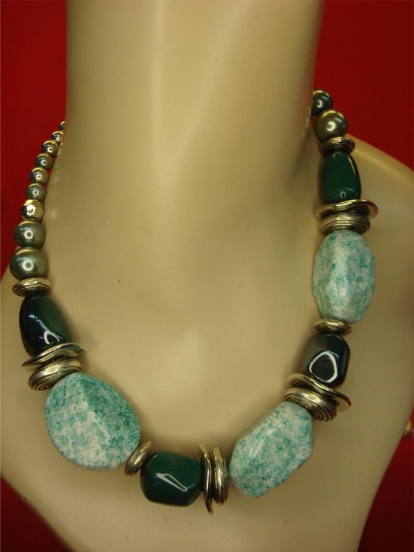 Vintage green stone necklace with a silver-tone chain
