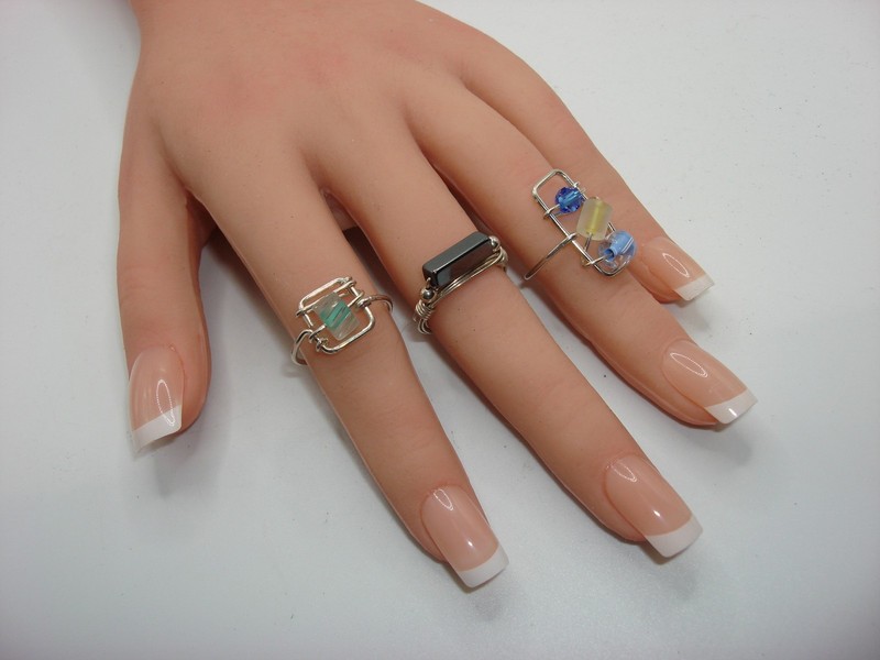 Set of three vintage sterling silver wire-wrapped rings in sizes 4.5 and 6.