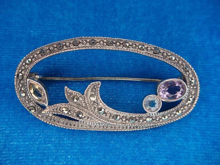 Art Nouveau amethyst, citrine, and marcasite brooch in sterling silver