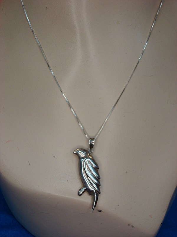 Sterling silver perched bird pendant necklace