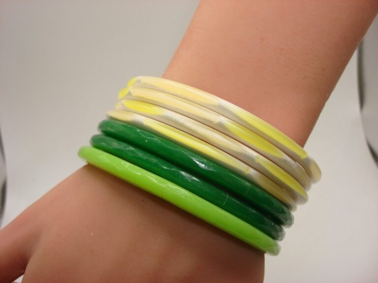 Set of seven vintage Lucite bangle bracelets in multicolor retro designs