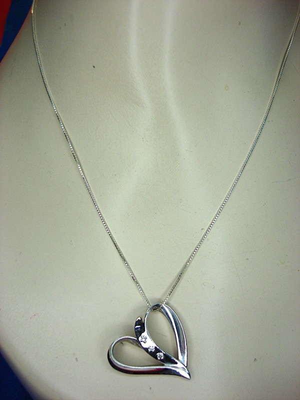 Sterling silver heart pendant necklace with 'My Daughter, My Heart, My Love' engraving