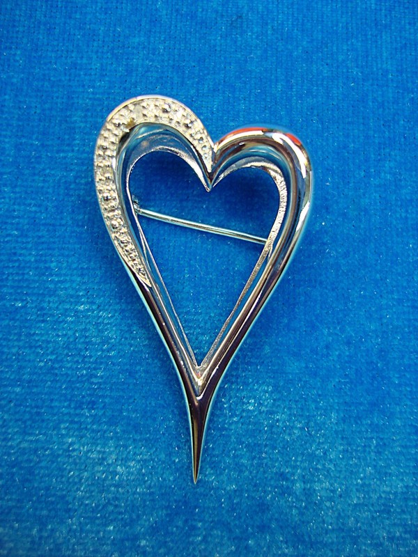 Sterling silver double heart pin with accent diamonds