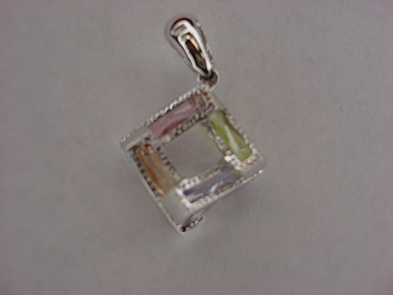 Sterling silver geometric pendant with baguette cubic zirconia stones