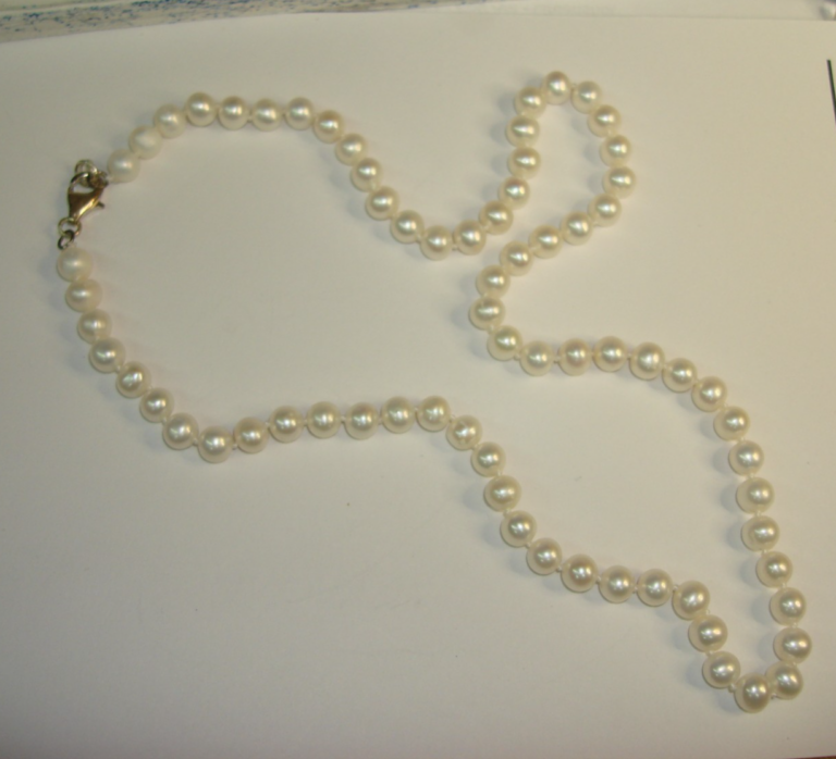 Sterling silver freshwater pearl necklace with a round white pearl