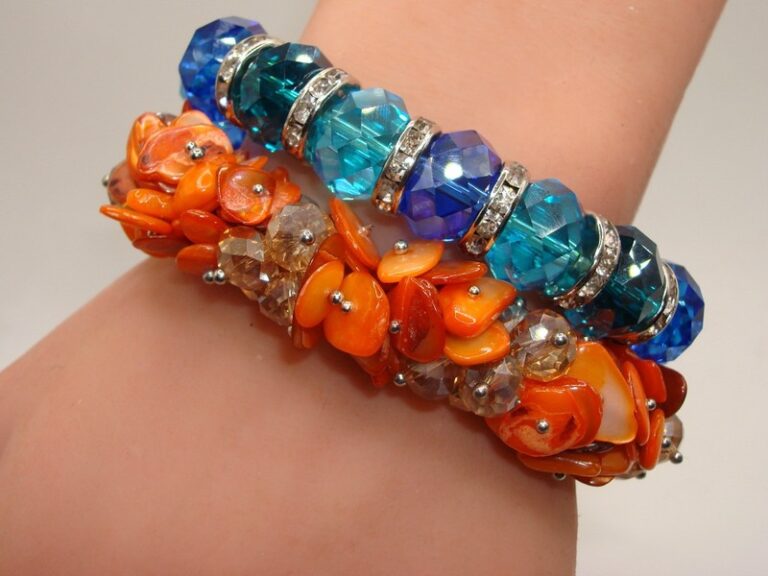 Vintage set of two crystal and mother-of-pearl stretch bracelets, orange and blue