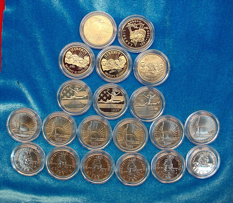 Collection of 20 US commemorative half dollars from 1986 to 2008, graded UNC and Proof, in original capsules.