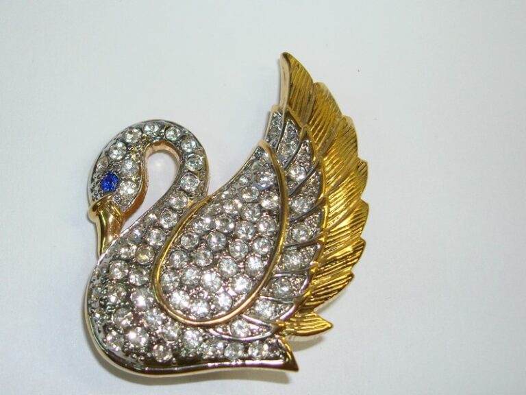 Vintage Park Lane Swarovski crystal swan pin with gold-tone finish and blue eye