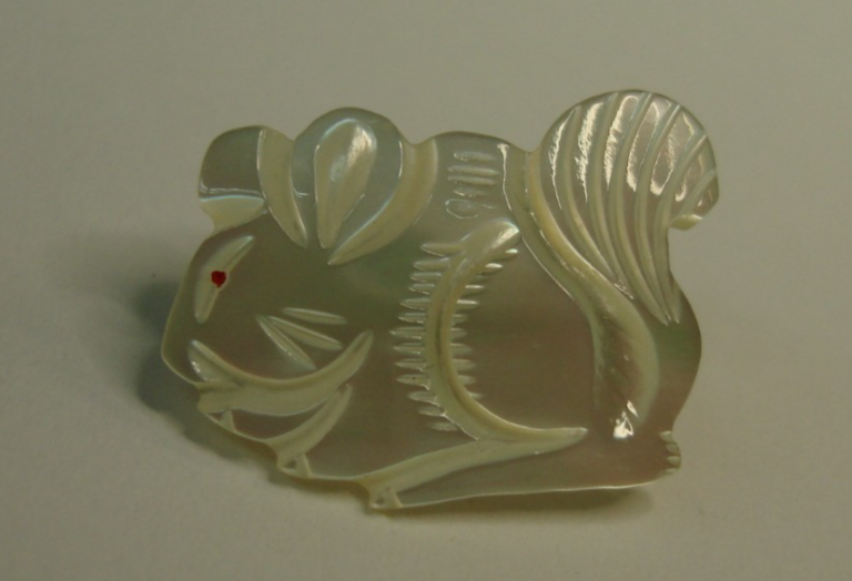 Vintage carved mother of pearl squirrel pin