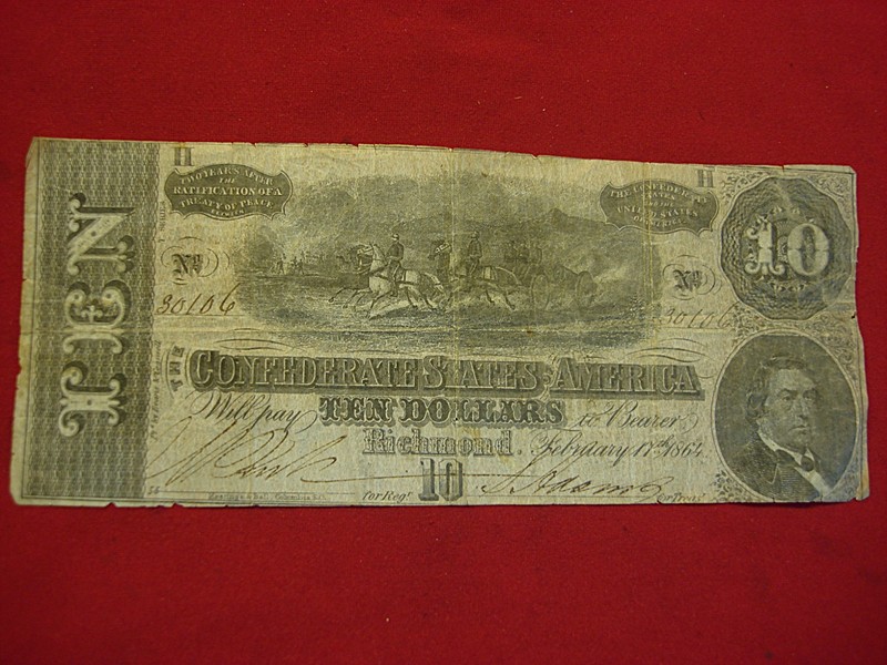 1864 Confederate $10 note (Series 7), circulated Civil War relic with wear and tear