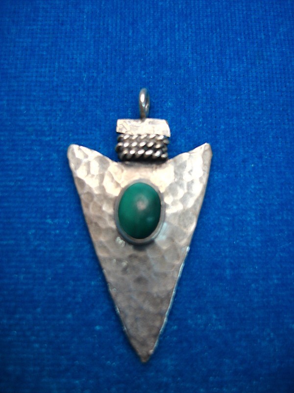Sterling silver arrowhead pendant with green stone