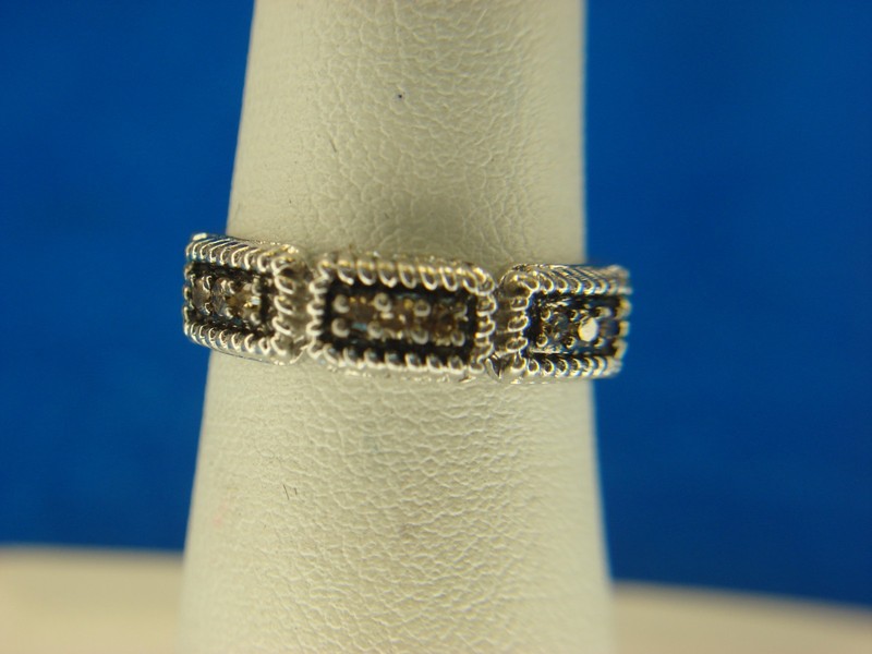 Sterling silver band ring with nine genuine diamonds, size 6