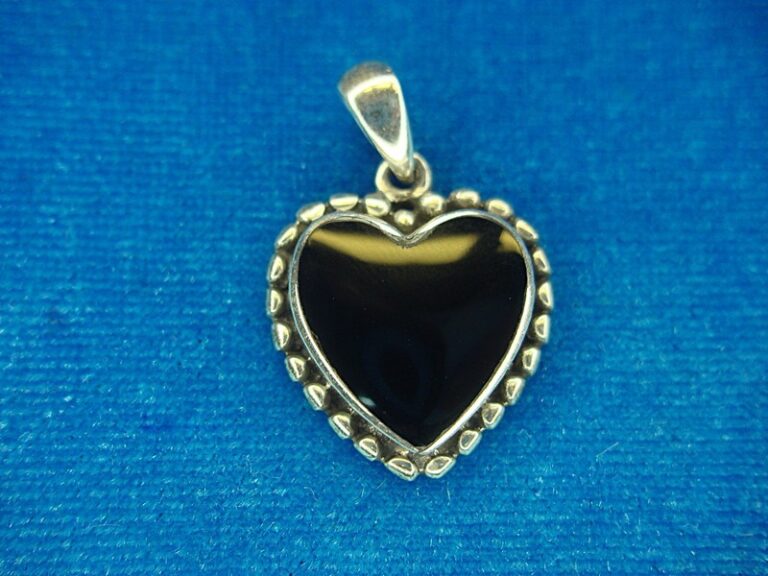 Vintage sterling silver heart pendant with black enamel