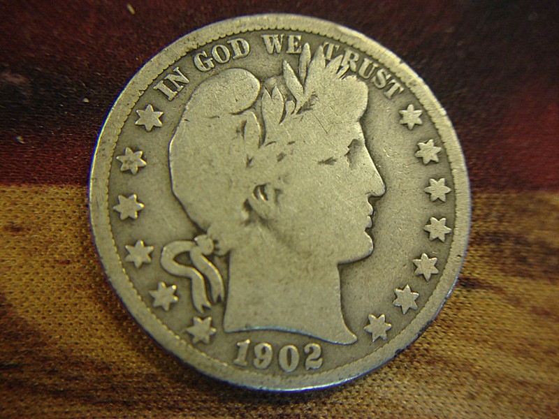 1902 S Barber Half Dollar coin, circulated condition with full ribbing and rim