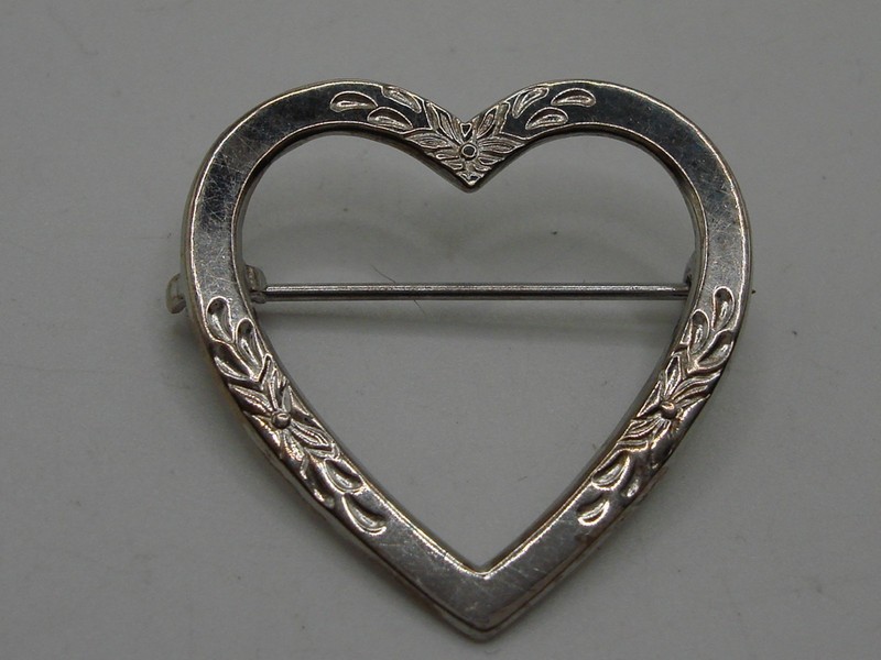 Vintage Bernard Abel & Co. sterling silver heart pin with floral design