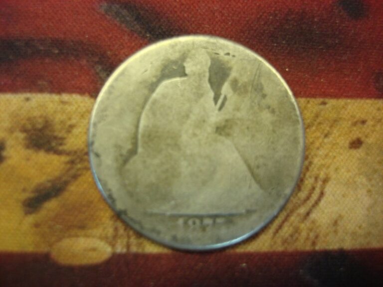 1875 Seated Liberty Half Dollar coin, well worn