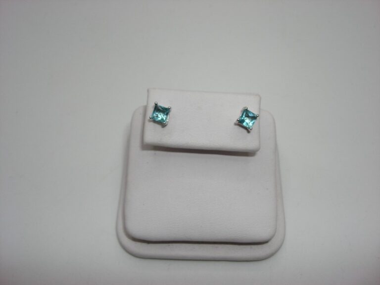 Sterling silver stud earrings with blue topaz gemstones