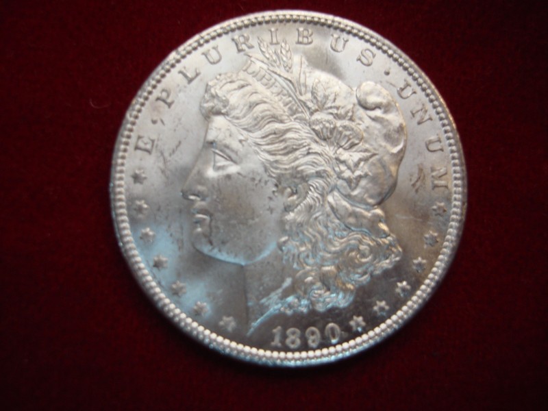 1890 CC Morgan Dollar, uncirculated with frostiness