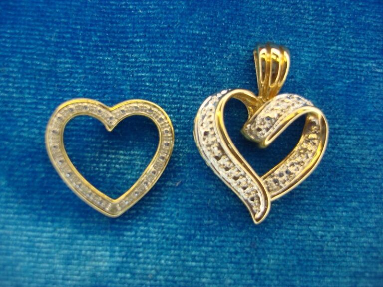 Two sterling silver and gold vermeil diamond heart pendants