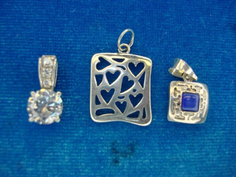 Set of 3 sterling silver pendants with CZ stones and a blue stone